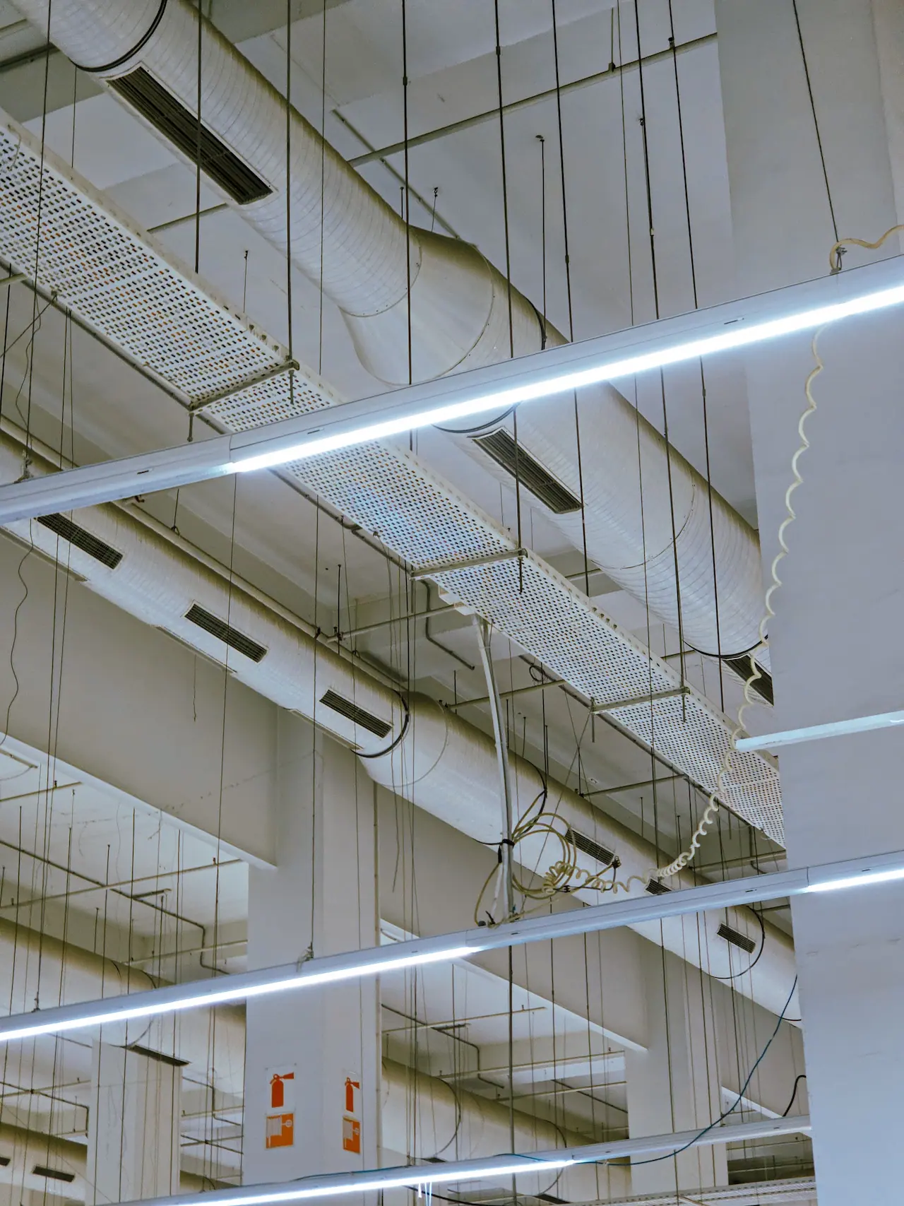 Ventilation system and HVAC ducts under a hall ceiling during acceptance testing